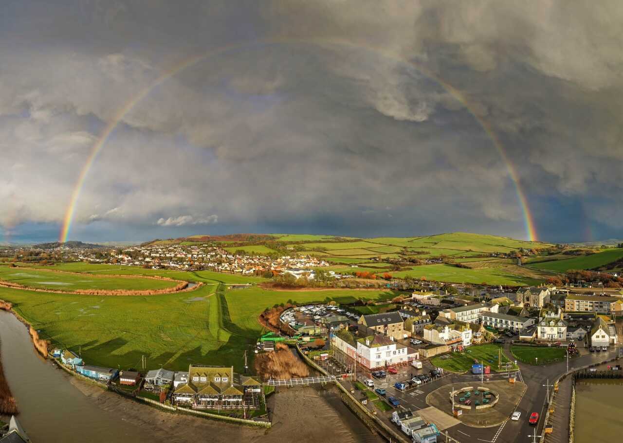 Rainbow over West Bay and the Dorset countryside